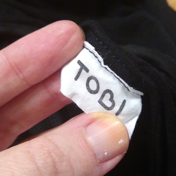 Sold 3/$15 sale Black high low cross back dress - Picture 8 of 11